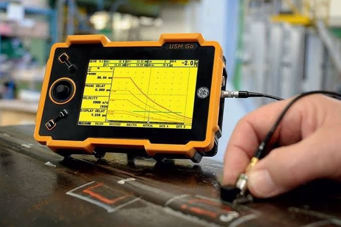 Ultrasonic testing equipment in use